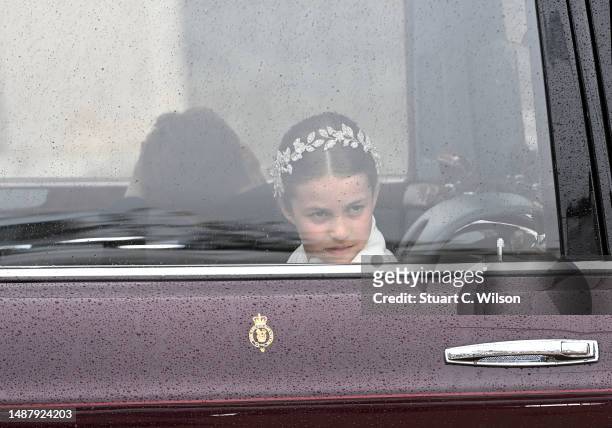 Princess Charlotte of Wales travelling in the state car during the Coronation of King Charles III and Queen Camilla on May 06, 2023 in London,...