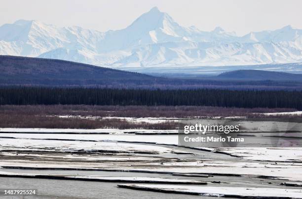 View of a boreal forest in front of Alaska Range mountains during the snowmelt season on May 5, 2023 near Delta Junction, Alaska. The NASA SnowEx...