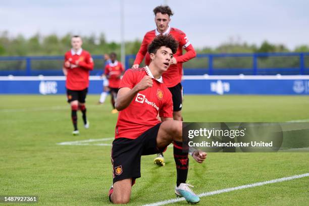 Ethan Wheatley of Manchester United celebrates after scoring their sides first goal during the U18 Premier League match between Everton and...