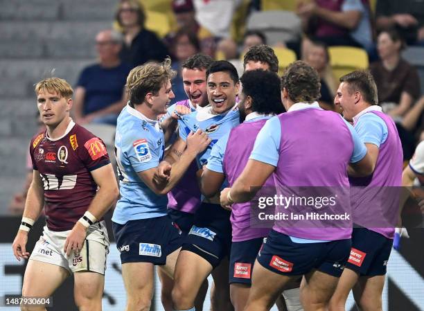 Lalakai Foketi of the Waratahs celebrates after scoring a try during the round 11 Super Rugby Pacific match between Queensland Reds and NSW Waratahs...