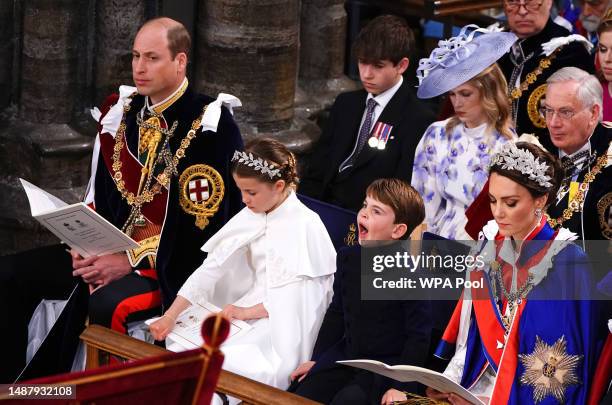 Britain's Prince William, Prince of Wales, Princess Charlotte, Prince Louis and Britain's Catherine, Princess of Wales attend the Coronation of King...