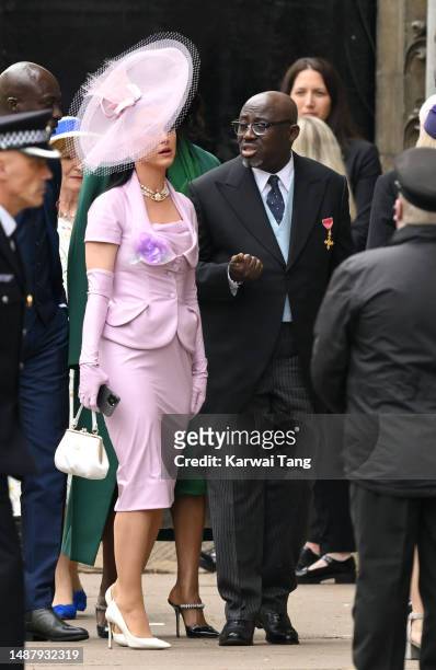Katy Perry and Edward Enninful arrive at Westminster Abbey for the Coronation of King Charles III and Queen Camilla on May 06, 2023 in London,...