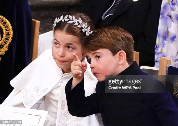 Britain's Prince Louis and Princess Charlotte attend the Coronation of King Charles III and Queen Camilla at Westminster Abbey on May 6, 2023 in...
