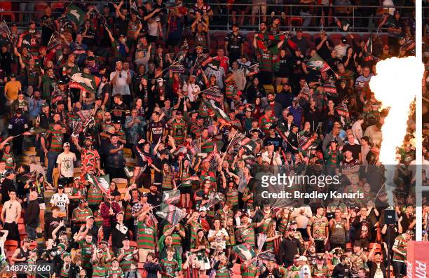 South Sydney fans celebrate their teams victory after the round 10 NRL match between Melbourne Storm and South Sydney Rabbitohs at Suncorp Stadium on...