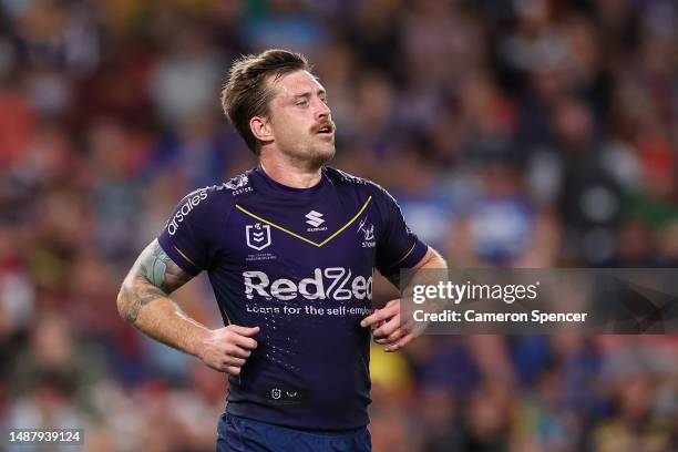 Cameron Munster of the Storm runs during the round 10 NRL match between Melbourne Storm and South Sydney Rabbitohs at Suncorp Stadium on May 06, 2023...