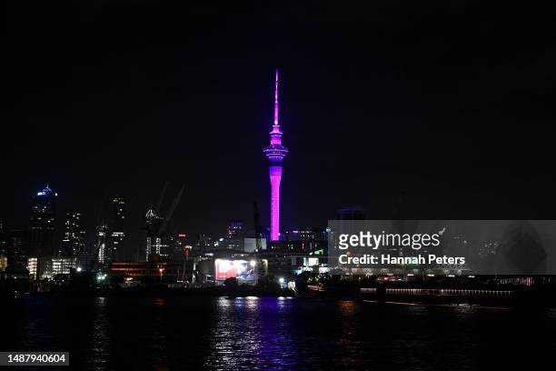 The Auckland Sky Tower is lit up in ‘royal purple’ to celebrate His Majesty King Charles III’s coronation on May 06, 2023 in Auckland, New Zealand....