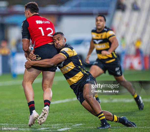 Toni Pulu of the Western Force attempts to tackle Crusader David Havili during the round 11 Super Rugby Pacific match between Crusaders and Western...