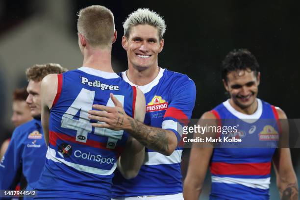 Tim English and Rory Lobb of the Bulldogs celebrate victory during the round eight AFL match between Greater Western Sydney Giants and Western...
