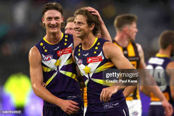 Jye Amiss and Nat Fyfe of the Dockers celebrate winning the round eight AFL match between Fremantle Dockers and Hawthorn Hawks at Optus Stadium, on...