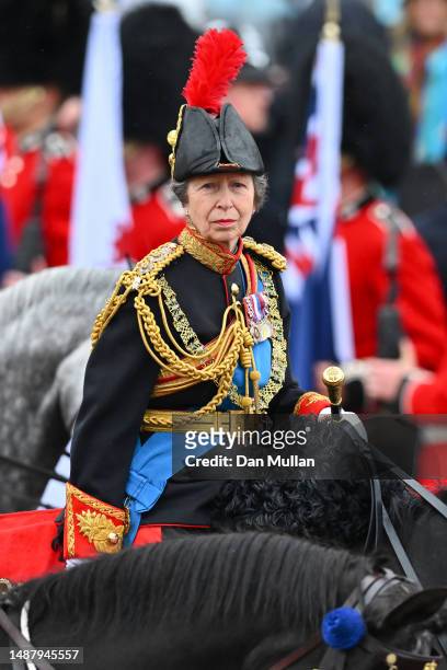 Princess Anne, Princess Royal rides on horseback behind the gold state coach carrying the newly crowned King and Queen Consort as they travel down...