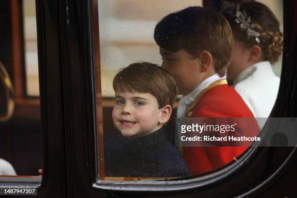 Prince Louis, Page of Honour Prince George and Princess Charlotte of Wales depart the Coronation service of King Charles III and Queen Camilla on May...