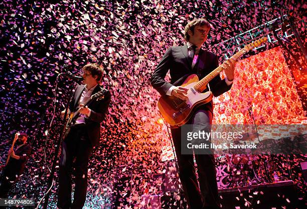 Damian Kulash and Andy Ross of the band OK Go perform during the 2012 Lacoste L!ve Concert Series the Williamsburg Waterfront on July 19, 2012 in New...