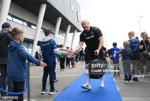 Carl Fearns of the Falcons high fives fans as the Falcons arrive prior to the Gallagher Premiership Rugby match between Sale Sharks and Newcastle...