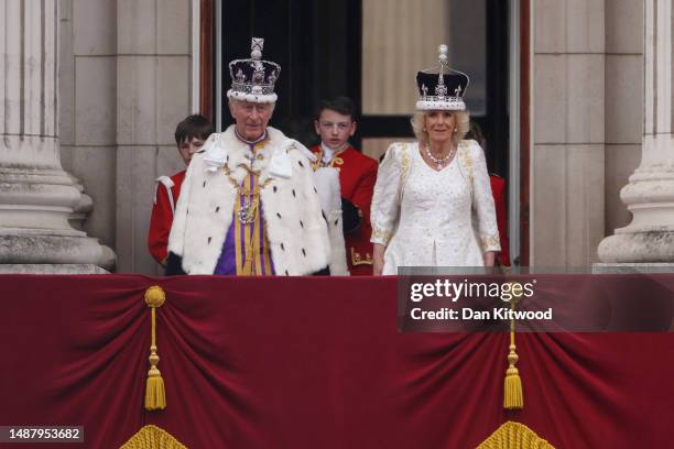 King Charles III, Camilla, Queen Consort can be seen on the Buckingham Palace balcony ahead of the flypast during the Coronation of King Charles III...