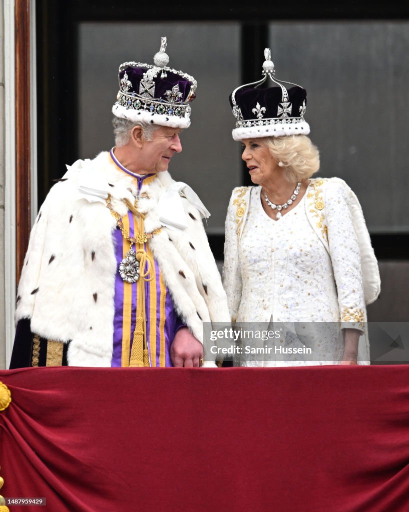 King Charles III and Queen Camilla can be seen on the Buckingham ...