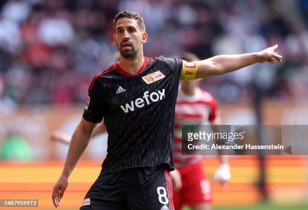 Rani Khedira of 1.FC Union Berlin gestures during the Bundesliga match between FC Augsburg and 1. FC Union Berlin at WWK-Arena on May 06, 2023 in...