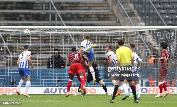 Marc-Oliver Kempf of Hertha Berlin scores the team's first goal during the Bundesliga match between Hertha BSC and VfB Stuttgart at Olympiastadion on...