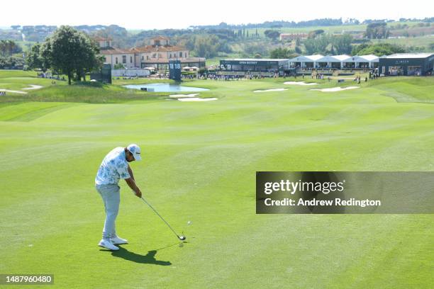 Romain Langasque of France plays their second shot on the 18th hole during Day Three of the DS Automobiles Italian Open at Marco Simone Golf Club on...