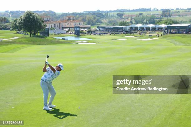 Romain Langasque of France plays their second shot on the 18th hole during Day Three of the DS Automobiles Italian Open at Marco Simone Golf Club on...