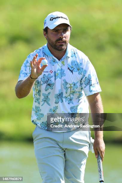 Romain Langasque of France acknowledges spectators on the 18th green during Day Three of the DS Automobiles Italian Open at Marco Simone Golf Club on...