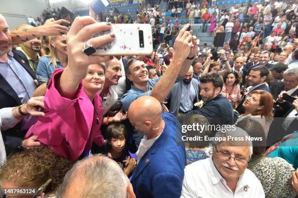 The President of the Government, Pedro Sanchez, greets the attendees during a pre-campaign rally, at the Prince of Asturias Pavilion, on May 6 in...