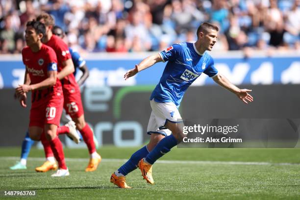Andrej Kramaric of TSG Hoffenheim celebrates after scoring their sides second goal from the penalty spot during the Bundesliga match between TSG...