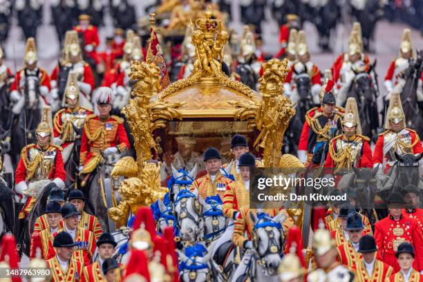 King Charles III and Queen Camilla travelling in the Gold State Coach built in 1760 and used at every Coronation since that of William IV in 1831sets...