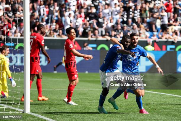 Ihlas Bebou of TSG Hoffenheim celebrates after scoring their sides third goal during the Bundesliga match between TSG Hoffenheim and Eintracht...