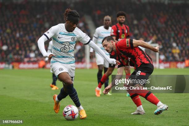 Noni Madueke of Chelsea runs ahead of Matias Vina of AFC Bournemouth during the Premier League match between AFC Bournemouth and Chelsea FC at...