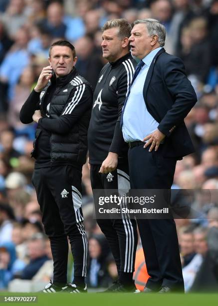 Robbie Keane. Coach of Leeds United, Karl Robinson, Assistant Manager of Leeds United and Sam Allardyce, Manager of Leeds United, look on during the...