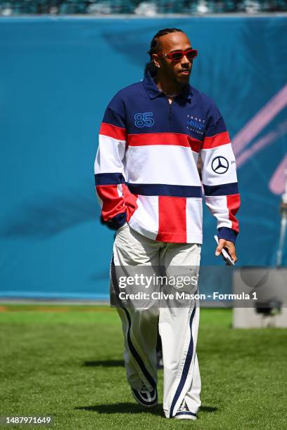 Lewis Hamilton of Great Britain and Mercedes walks in the Paddock prior to final practice ahead of the F1 Grand Prix of Miami at Miami International...