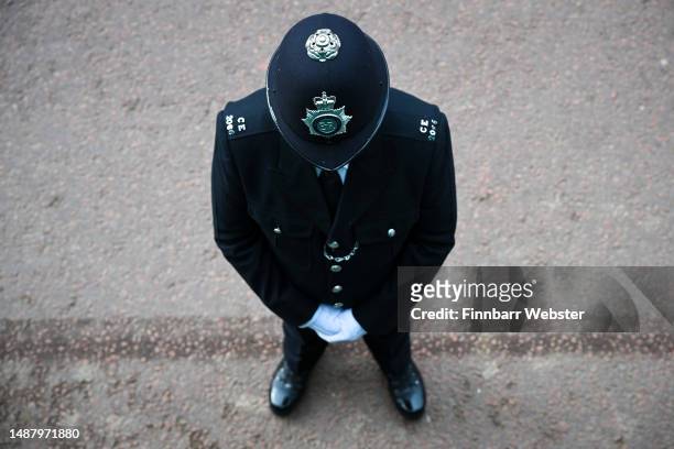 Police are seen during the Coronation of King Charles III and Queen Camilla on May 06, 2023 in London, England. The Coronation of Charles III and his...