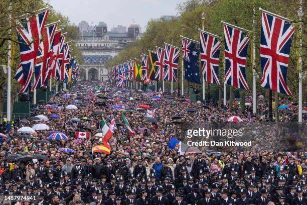 Police maneuver the public down The Mall towards Buckingham Palace during the Coronation of King Charles III and Queen Camilla on May 06, 2023 in...