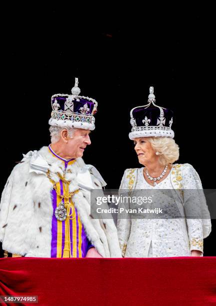 King Charles III and Queen Camilla at the balcony of Buckingham Palace following the Coronation of King Charles III and Queen Camilla on May 6, 2023...