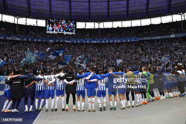 Hertha Berlin players celebrate towards the fan after the team's victory in the Bundesliga match between Hertha BSC and VfB Stuttgart at...