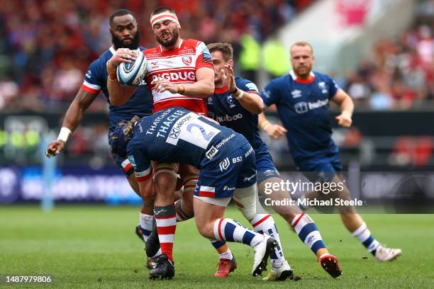 Lewis Ludlow of Gloucester feels the force of Harry Thacker of Bristol during the Gallagher Premiership Rugby match between Bristol Bears and...