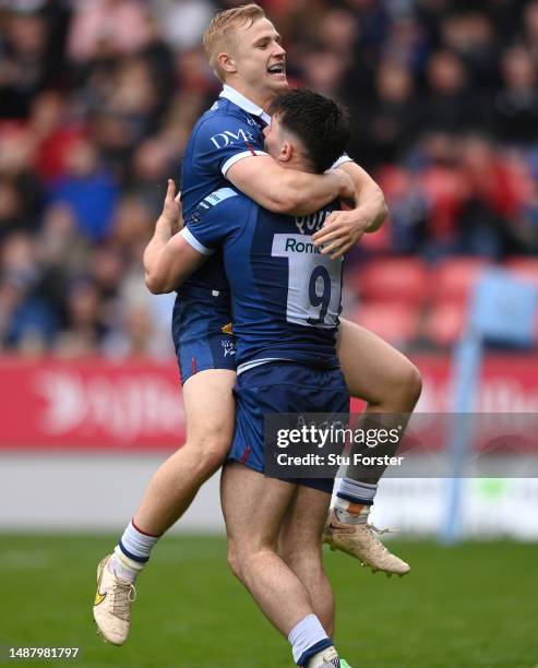 Sale scrum half Raffi Quirke celebrates with winger Aaron Reed after scoring the 5th try during the Gallagher Premiership Rugby match between Sale...