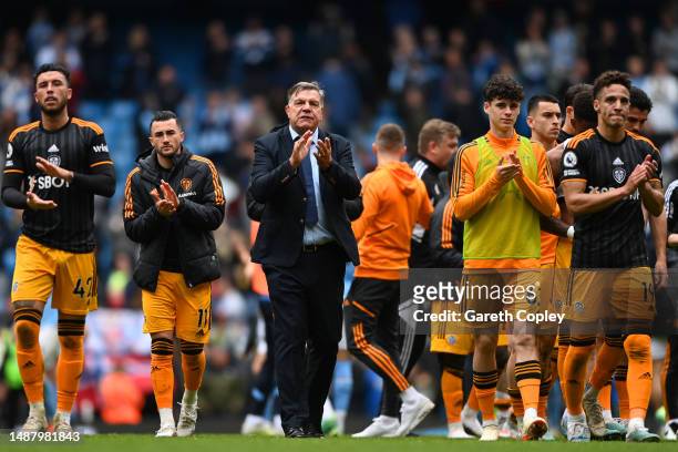 Sam Allardyce, Manager of Leeds United, applauds fans after the Premier League match between Manchester City and Leeds United at Etihad Stadium on...