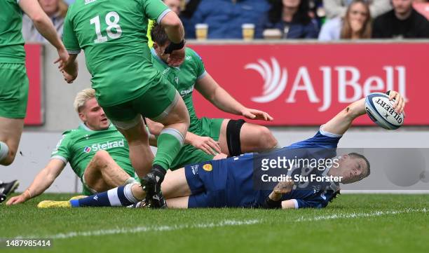 Sale player Sam James reaches over to score the final try during the Gallagher Premiership Rugby match between Sale Sharks and Newcastle Falcons at...