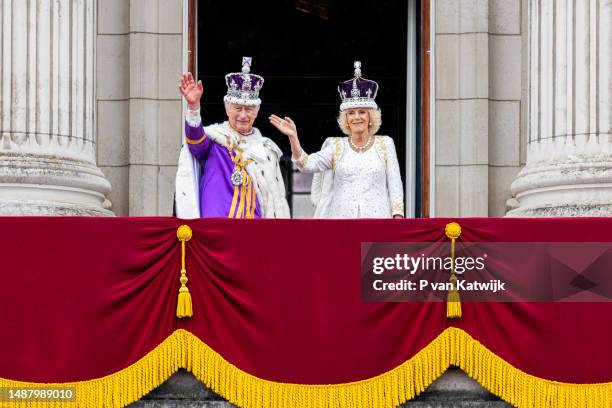 King Charles III and Queen Camilla at the balcony of Buckingham Palace following the Coronation of King Charles III and Queen Camilla on May 6, 2023...