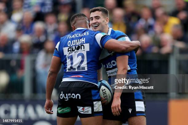 Orlando Bailey of Bath Rugby celebrates scoring the team's eighth try with teammate Max Ojomoh during the Gallagher Premiership Rugby match between...