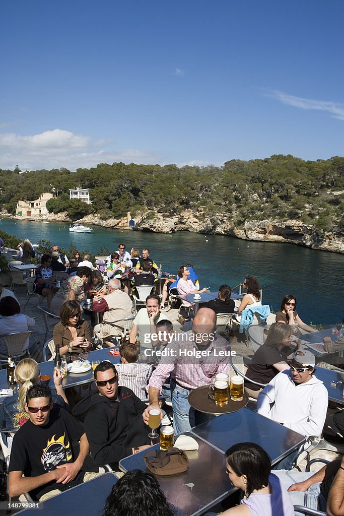 Outdoor cafe at Cala Figuera cove.