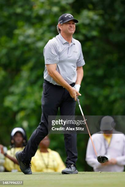Lee Janzen of the United States watches his tee shot on the second hole during the second round of the Mitsubishi Electric Classic at TPC Sugarloaf...