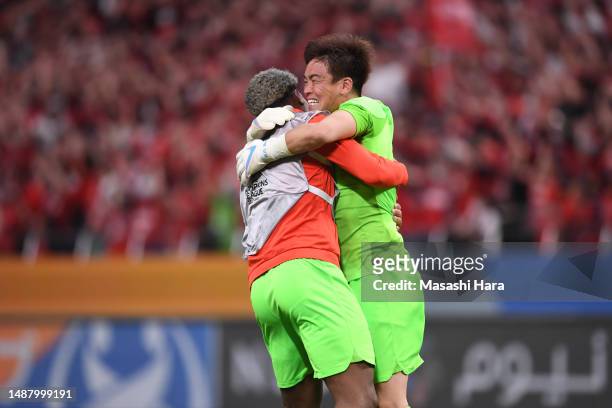 Shusaku Nishikawa and Zion Suzuki of Urawa Reds celebrate the win after the AFC Champions League final second leg between Urawa Red Diamonds and...