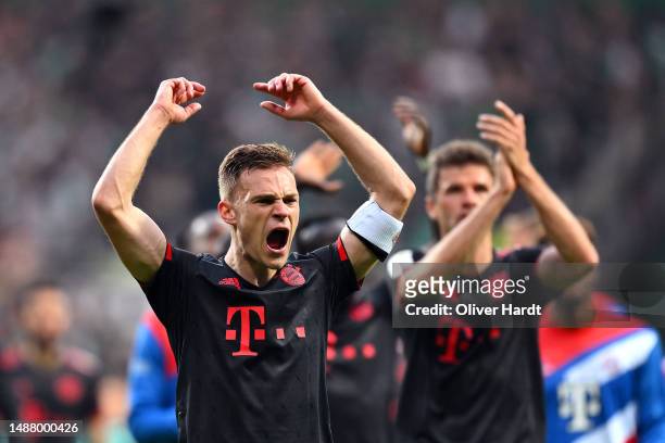 Joshua Kimmich of FC Bayern Munich celebrates following their sides victory after the Bundesliga match between SV Werder Bremen and FC Bayern München...