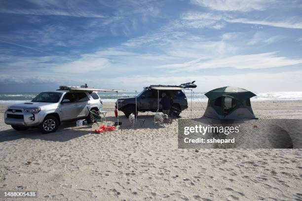 overland camping on the beach with 4runners - cape lookout national seashore stock pictures, royalty-free photos & images