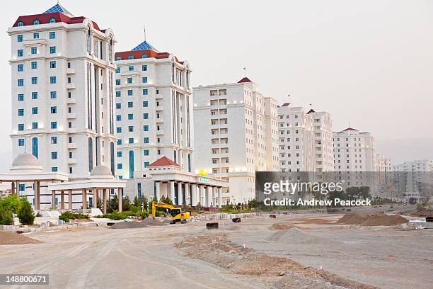 new tall apartment buildings. - turkmenistan stock pictures, royalty-free photos & images
