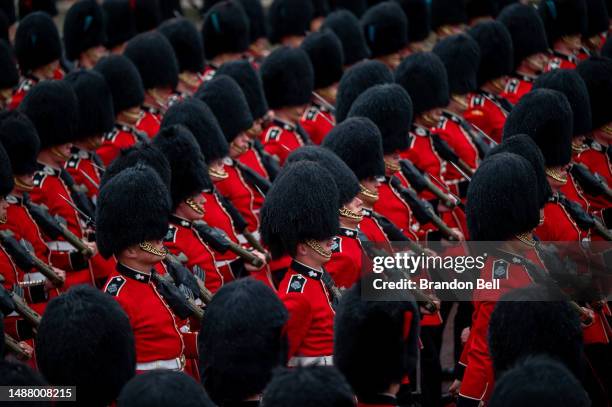 Coldstream Guards march in front of Buckingham Palace ahead of the Coronation of King Charles III and Queen Camilla on May 06, 2023 in London,...