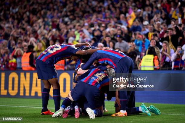 Jordi Alba of FC Barcelona celebrates with teammates after scoring their team's first goal during the LaLiga Santander match between FC Barcelona and...