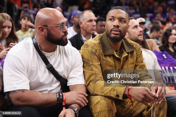 Athlete Damian Lillard attends Game Three of the NBA Western Conference Semifinals between the Phoenix Suns and the Denver Nuggets at Footprint...